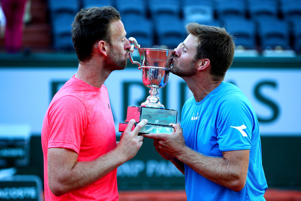 Photo Source: Clive Brunskill/Getty Images Europe-Ryan Harrison and Michael Venus kissed the Roland Garros championship trophy.