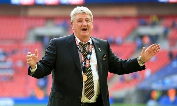 Bruce celebrates Hull's promotion. | Image credit: Nigel French/PA