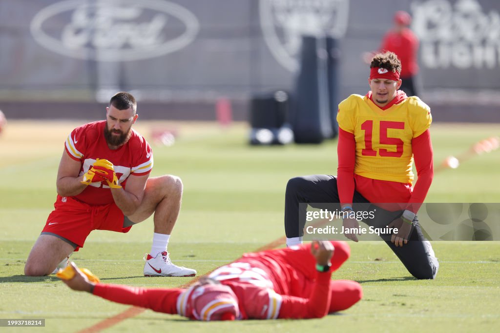 Quarterback Patrick Mahomes #15 and tight end Travis Kelce #87 warm up during Kansas City Chiefs practice ahead of Super Bowl LVIII at the Las Vegas Raiders Headquarters/Intermountain Healthcare Performance Center on February 07, 2024 in Henderson, Nevada. (Photo by Jamie Squire/Getty Images)