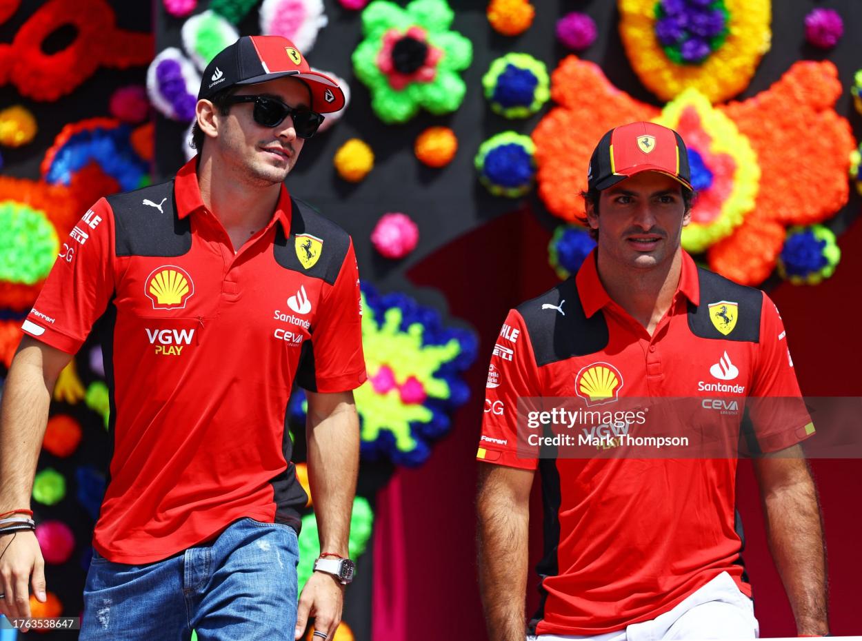 Charles Leclerc of Monaco and Ferrari and <strong><a  data-cke-saved-href='https://www.vavel.com/en/motorsports/2023/11/18/formula-1/1163359-las-vegas-gp-qualifying-leclerc-on-pole-in-the-inaugural-race.html' href='https://www.vavel.com/en/motorsports/2023/11/18/formula-1/1163359-las-vegas-gp-qualifying-leclerc-on-pole-in-the-inaugural-race.html'>Carlos Sainz</a></strong> of Spain and Ferrari look on from the drivers parade prior to the F1 Grand Prix of Mexico at Autodromo Hermanos Rodriguez on October 29, 2023 in Mexico City, Mexico. (Photo by Mark Thompson/Getty Images)