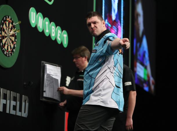 Daryl Gurney made sure that Raymond van Barneveld's poor run of form continued. (picture: PDC)