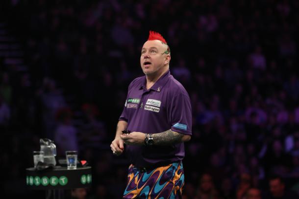 Peter Wright condemned Raymond van Barneveld to his second defeat of the night. (picture: Lawrence Lustig / PDC)