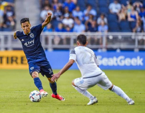 Kevin Venegas plays defense against Sporting Kansas City. (Allison Long/Kansas City Star)