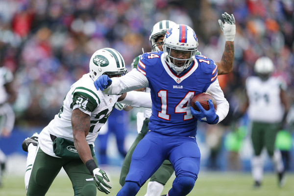 Sammy Watkins #14 of the Buffalo Bills breaks a tackle by Darrelle Revis #24 of the New York Jets during the second half at Ralph Wilson Stadium on January 3, 2016 in Orchard Park, New York. (Jan. 2, 2016 - Source: Brett Carlsen/Getty Images North America)