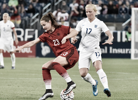 Sara Dabritz maneuvers past England's Katie Chapman in the 2016 SheBelieves Cup (Photo: Getty/Frederick Beeton)