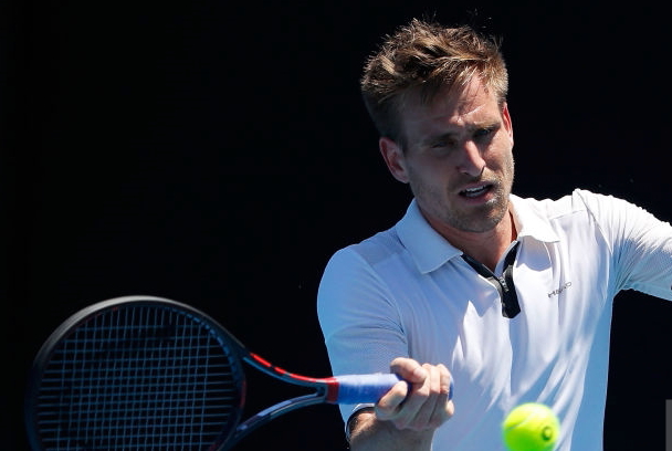 Photo Source: Scott Barbour/Getty Images: Peter Gojowczyk hits a forehand shot.