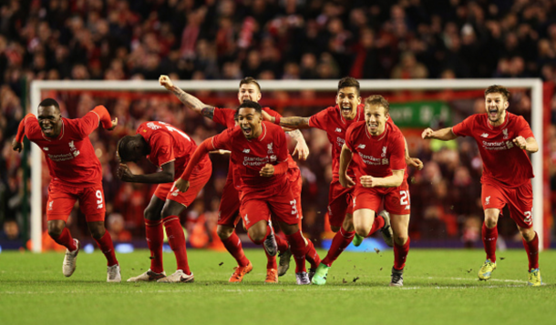 The Liverpool squad celebrate Joe Allen's winning penalty. (Picture: Getty Images)