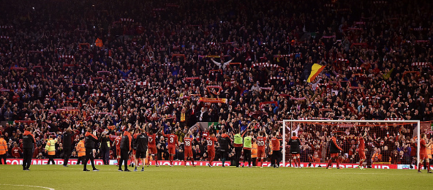 Liverpool players salute the Kop at the end of the game last night. Source (Getty Images)