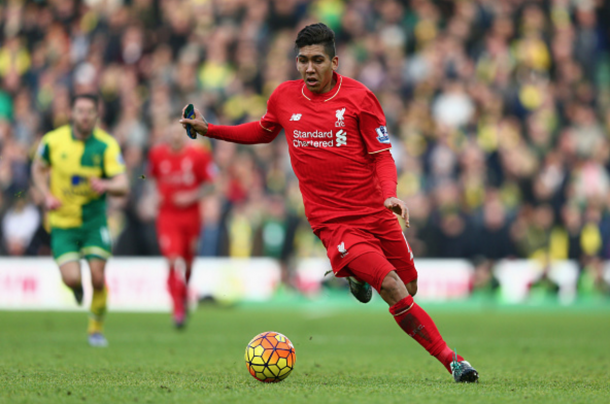 Firmino in action in the Reds' 5-4 win at Norwich, in which he scored twice. (Picture: Getty Images)