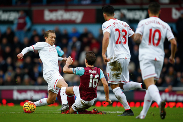 Lucas challenges Mark Noble in the Hammers' 2-0 win over the Reds earlier this month. (Picture: Getty Images)