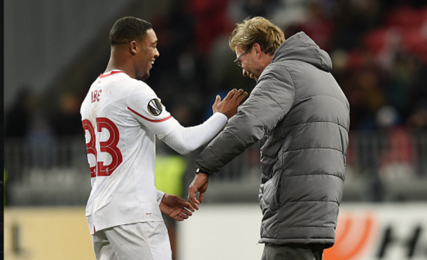 Ibe, after scoring his first goal for the club, with Klopp in Kazan. (Picture: Getty) 