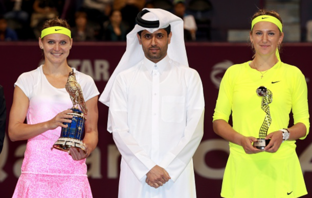 Lucie Safarova (L) of the Czech Republic, the winner of the Qatar Open tennis tournament, Chairman of Qatar Sports Investments, Nasser Al-Khelaifi (C) and Victoria Azarenka (R) of Belarus pose following the final of the women's singles Qatar Open tennis tournament on February 28, 2015 at Khalifa International Tennis and Squash Complex in Doha. (Photo by Mohamed Farag/Anadolu Agency/Getty Images)