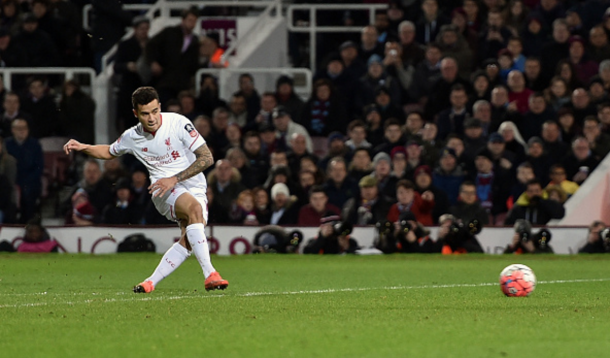 Coutinho rolls his free-kick under the West Ham wall to mark his return with a goal. (Picture: Getty Images)