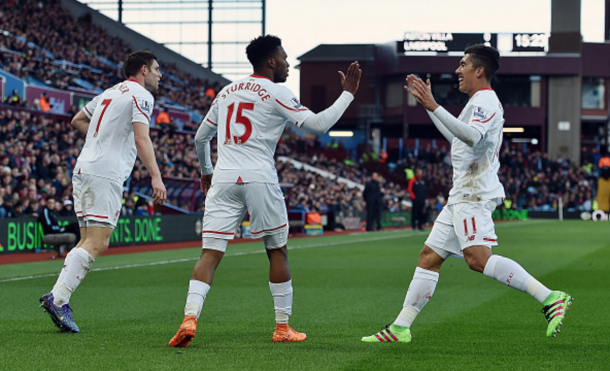 Sturridge celebrates his opening goal with James Milner and Roberto Firmino. (Picture: Getty Images)