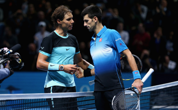 Novak Djokovic of Serbia shakes hands at the net after his straight sets victory against Rafael Nadal of Spain during the men's singles semi final match on day seven of the Barclays ATP World Tour Finals at O2 Arena on November 21, 2015 in London, England. (Photo by Clive Brunskill/Getty Images)