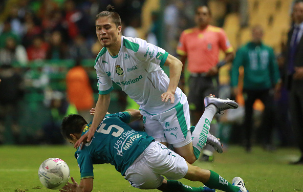 Former Timber, Jorge Villafana (white jersey), now playing with Santos Laguna.