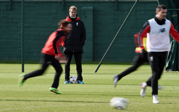 Klopp watches on as his players train. (Picture: Getty Images)