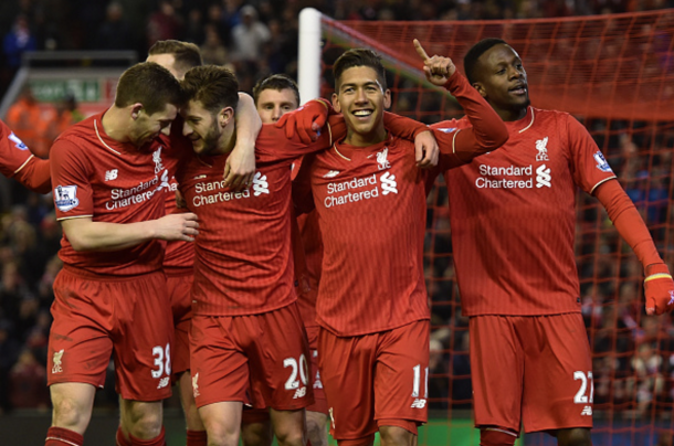 The Liverpool team after Firmino made it three. (Picture: Getty Images)