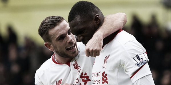 Henderson congratulates match winner Christian Benteke after his penalty. (Image: Getty Images)