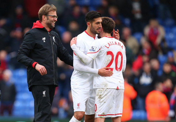 An elated Klopp on the pitch with his players after full-time. (Picture: Getty Images)