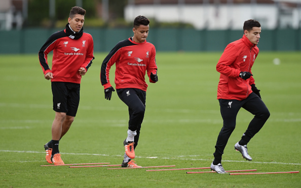 Allan with fellow Brazilians Roberto Firmino and Philippe Coutinho in Liverpool training. (Picture: Getty Images)