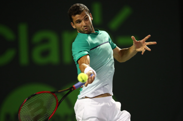 Grigor Dimitrov of Bulgaria plays a forehand against Gael Monfils of France in their fourth round match during the Miami Open Presented by Itau at Crandon Park Tennis Center on March 29, 2016 in Key Biscayne, Florida. (Photo by Clive Brunskill/Getty Images)