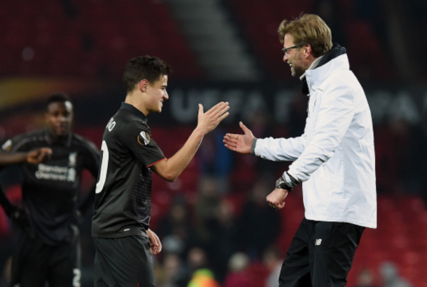 A delighted Klopp with Coutinho after his stunning solo goal away at United. (Picture: Getty Images)