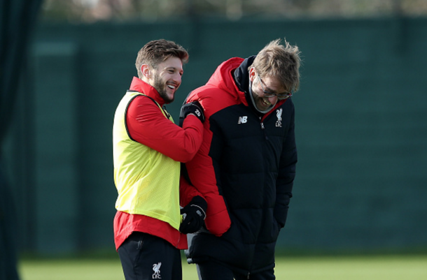 Lallana shares a joke with Klopp in training. (Picture: Getty Images)