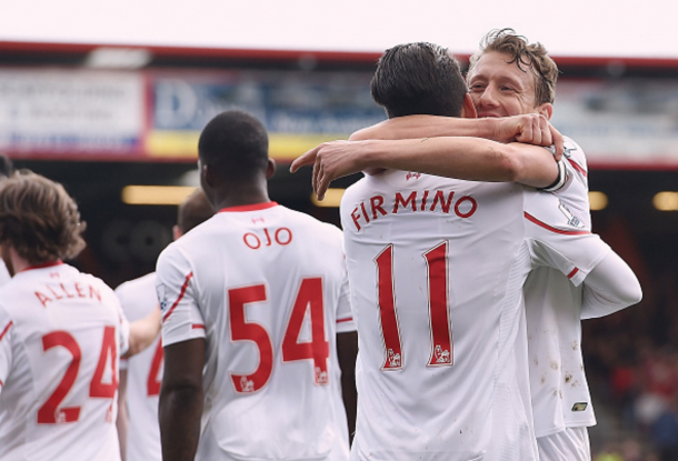 Lucas Leiva and Firmino celebrate Liverpool's opening goal. (Picture: Getty Images)