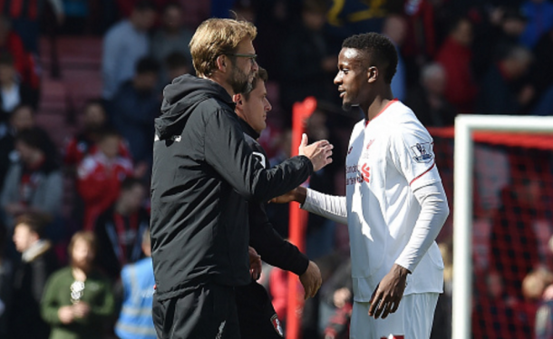 Origi and Klopp after the full-time whistle at Bournemouth on Sunday. (Picture: Getty Images)