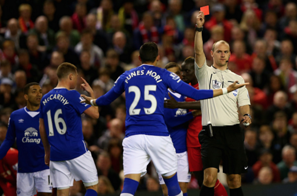 Funes Mori sees red for a horrendous challenge on Origi, which forced the striker off. (Picture: Getty Images)