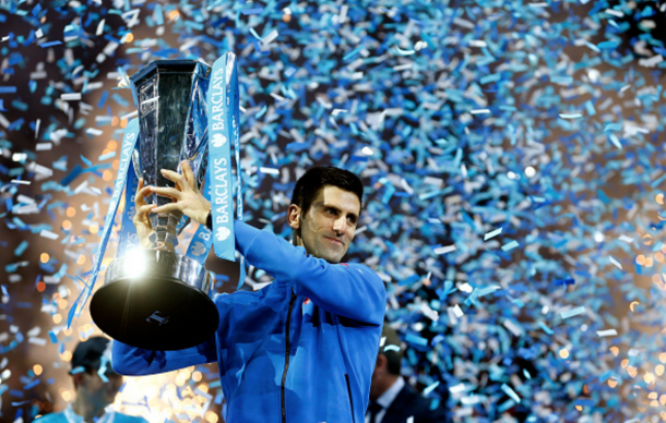 Novak Djokovic of Serbia lifts the trophy following his victory during the men's singles final against Roger Federer of Switzerland on day eight of the Barclays ATP World Tour Finals at the O2 Arena on November 22, 2015 in London, England. (Photo by Julian Finney/Getty Images)