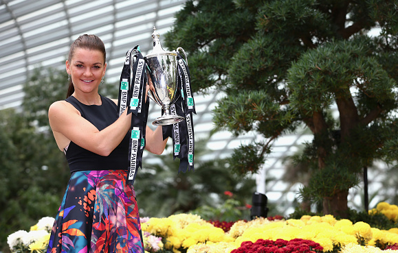 Radwanska with the Billie Jean King Trophy. Photo:Getty Images/Clive Brunskill