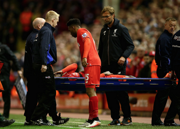 Origi is stretchered off in the Merseyside Derby last month after a nasty-looking injury. (Picture: Getty Images)