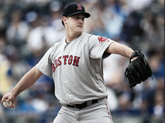 Steven Wright lasted eight innings, but was dealt the loss. | AP