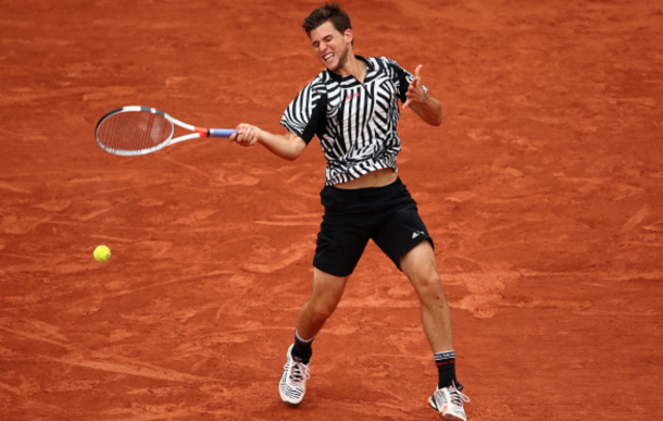 Dominic Thiem of Austria hits a forehand during the Men's Singles semi final match againstNovak Djokovic of Serbia on day thirteen of the 2016 French Open at Roland Garros on June 3, 2016 in Paris, France. (Photo by Clive Brunskill/Getty Images)