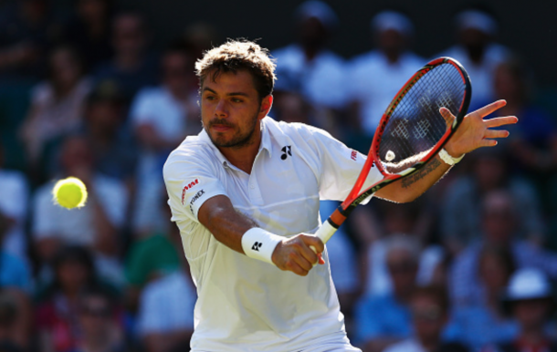 Stanislas Wawrinka of Switzerland plays a backhand in his Gentlemens Singles first round match against Joao Sousa of Portugal during day one of the Wimbledon Lawn Tennis Championships at the All England Lawn Tennis and Croquet Club on June 29, 2015 in London, England. (Photo by Julian Finney/Getty Images)