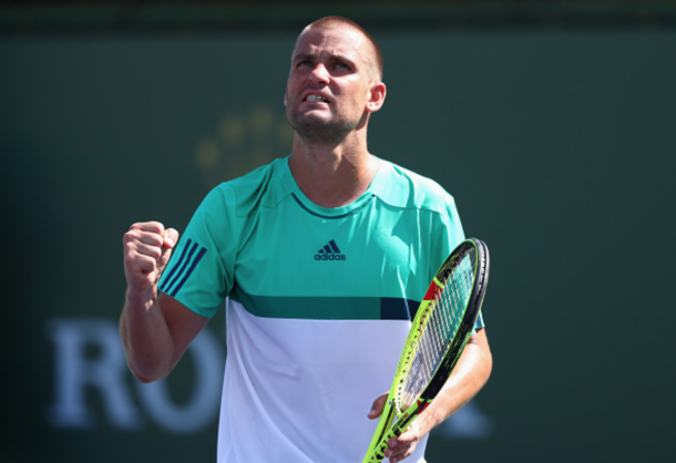 Mikhail Youzhny of Russia celebrates winning a game in his match against Aljaz Bedene of Great Britain during day five of the BNP Paribas Open at Indian Wells Tennis Garden on March 11, 2016 in Indian Wells, California. (Photo by Julian Finney/Getty Images)