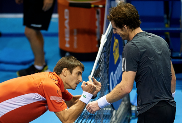 Tommy Robredo of Spain reacts to Andy Murray of Great Britain in the final at the end of the match on day seven of the ATP 500 World Tour Valencia Open tennis tournament at the Ciudad de las Artes y las Ciencias on October 26, 2014 in Valencia, Spain. (Photo by Manuel Queimadelos Alonso/Getty Images)