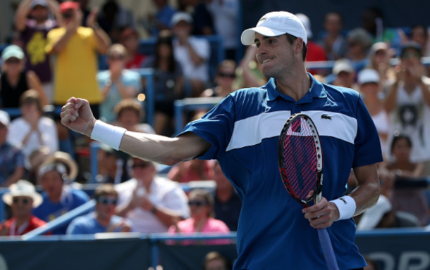 John Isner of the United States reacts against Kei Nishikori of Japan in the men's singles final during the Citi Open at Rock Creek Park Tennis Center on August 9, 2015 in Washington, DC. (Photo by Patrick Smith/Getty Images)