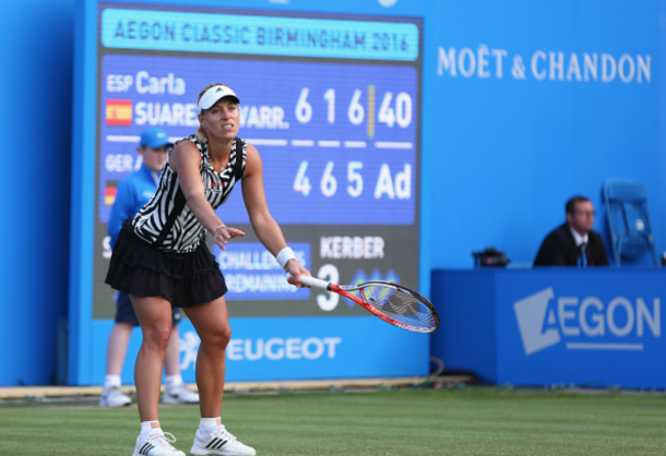 Angelique Kerber of Germany reacts during her women's singles quarter final match against Carla Suarez Navarro of Spain on day five of the WTA Aegon Classic at Edgbaston Priory Club on June 17, 2016 in Birmingham, England. (Photo by Steve Bardens/Getty Images for LTA)