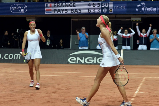 rance's Caroline Garcia (L) and Kristina Mladenovic celebrate after France won the Fed Cup semi-final double tennis match against the Netherlands in Trelaze, northwestern France, on April 17, 2016. / AFP / JEAN-FRANCOIS MONIER