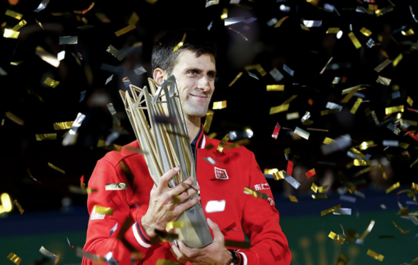 Novak Djokovic of Serbia poses with the winner's trophy after defeating Jo-Wilfried Tsonga of France during the men's singles final match of the Shanghai Rolex Masters at the Qi Zhong Tennis Center on day 8 of Shanghai Rolex Masters at Qi Zhong Tennis Centre on October 18, 2015 in Shanghai, China. (Photo by Lintao Zhang/Getty Images)