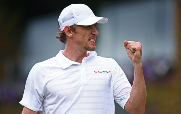 John Millman of Australia celebrates during the Men's Singles second round match against Benoit Pare of France on day four of the Wimbledon Lawn Tennis Championships at the All England Lawn Tennis and Croquet Club on June 30, 2016 in London, England. (Photo by Jordan Mansfield/Getty Images)