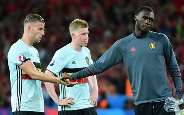 Benteke consoles his teammates after the final whistle confirmed their exit. (Picture: Getty Images)