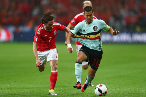 Allen chases Chelsea's Eden Hazard in their historic victory over Belgium. (Picture: Getty Images)