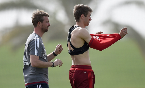 Kornmayer, pictured with Thomas Muller, who credits him for helping him transform him from a "slow snail" into a "speedy snail." (Picture: Getty Images)