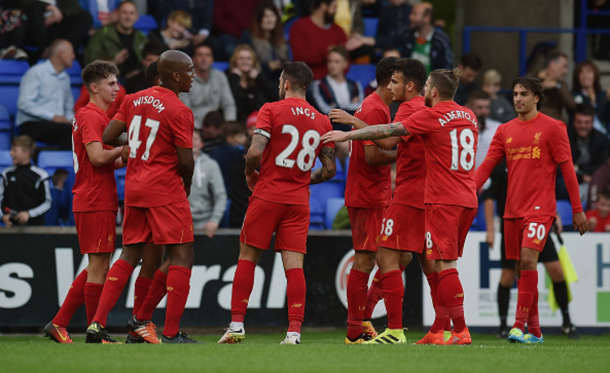 The Liverpool players celebrate Ings' late breakthrough. (Picture: Getty Images)