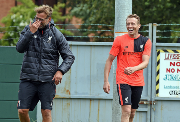 Klopp and Lucas share a laugh in pre-season training at Melwood last week. (Picture: Getty Images)