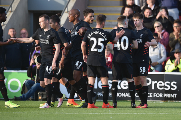 The Reds celebrate Woodburn's goal to double the lead after half-time. (Picture: Getty Images)